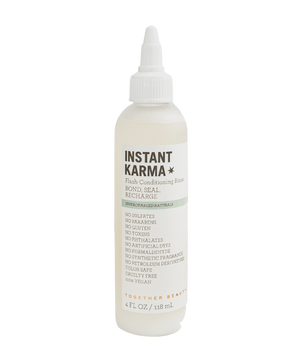 Instant Karma flash conditioning rinse that bonds, seals, and recharges hair.